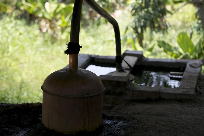 one of two san luis stills and its condensing tank. distilling is calm work